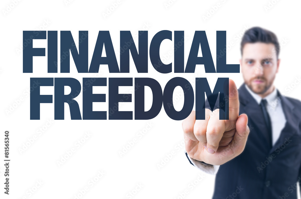 Business man pointing the text: Financial Freedom Business man pointing the text: Financial Freedom