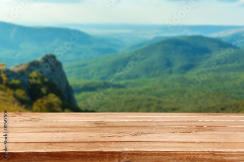 Wooden. Wooden table. Spring design with pine forest and empty