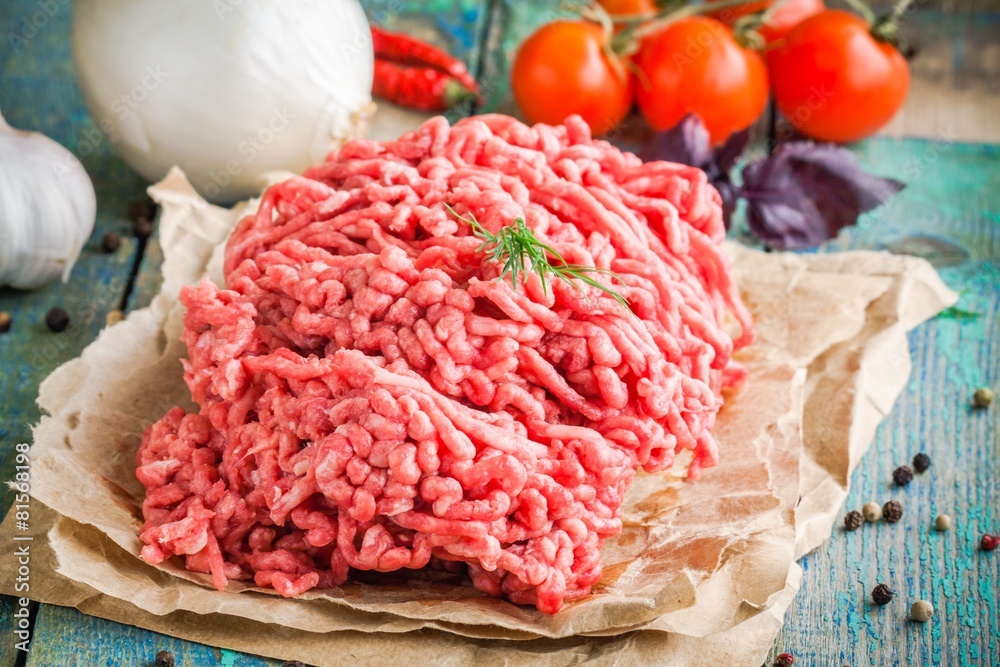 fresh raw ground beef on a paper fresh raw ground beef on a paper