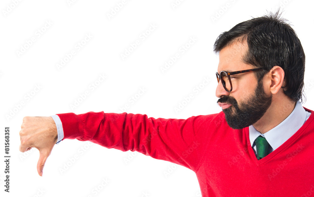 Hipster man doing bad signal Hipster man doing bad signal