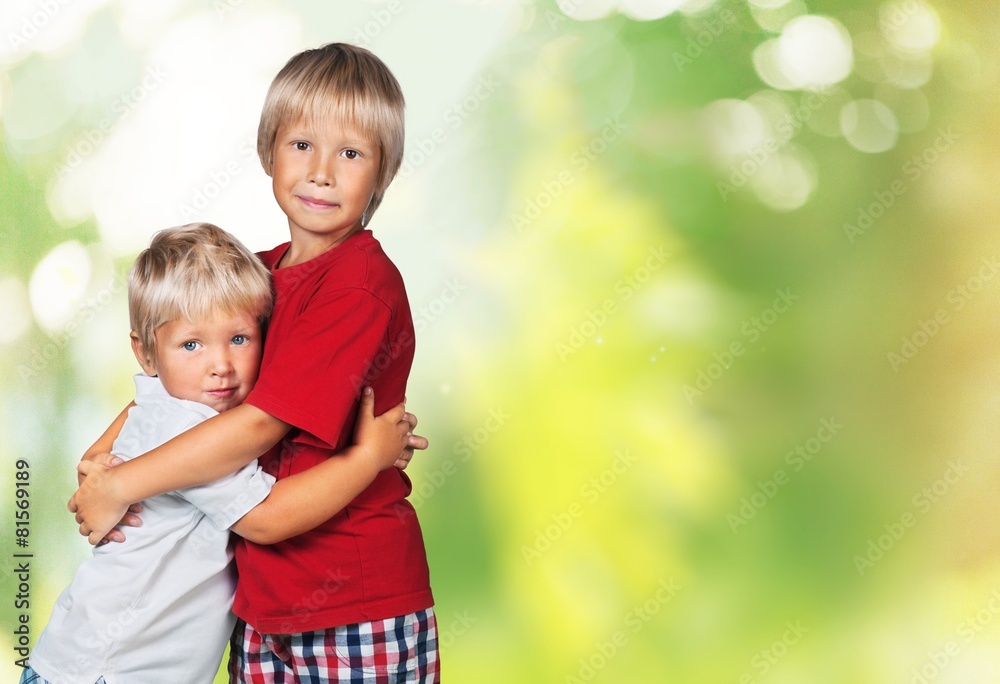 Hugging. Happy brother and sister smiling and embracing. Hugging. Happy brother and sister smiling and embracing.