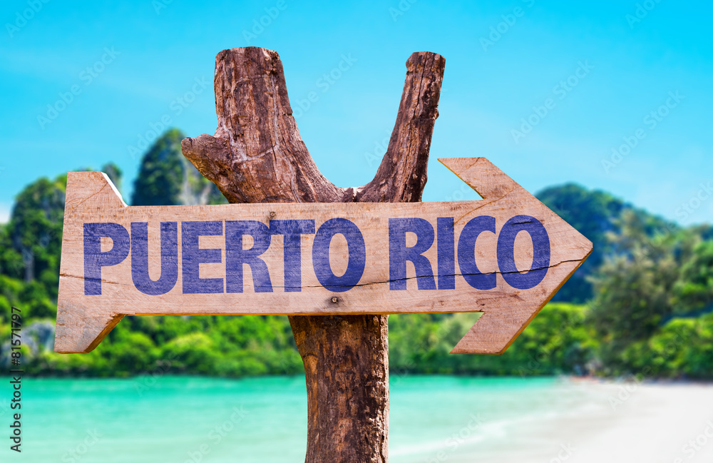 Puerto Rico wooden sign with beach background