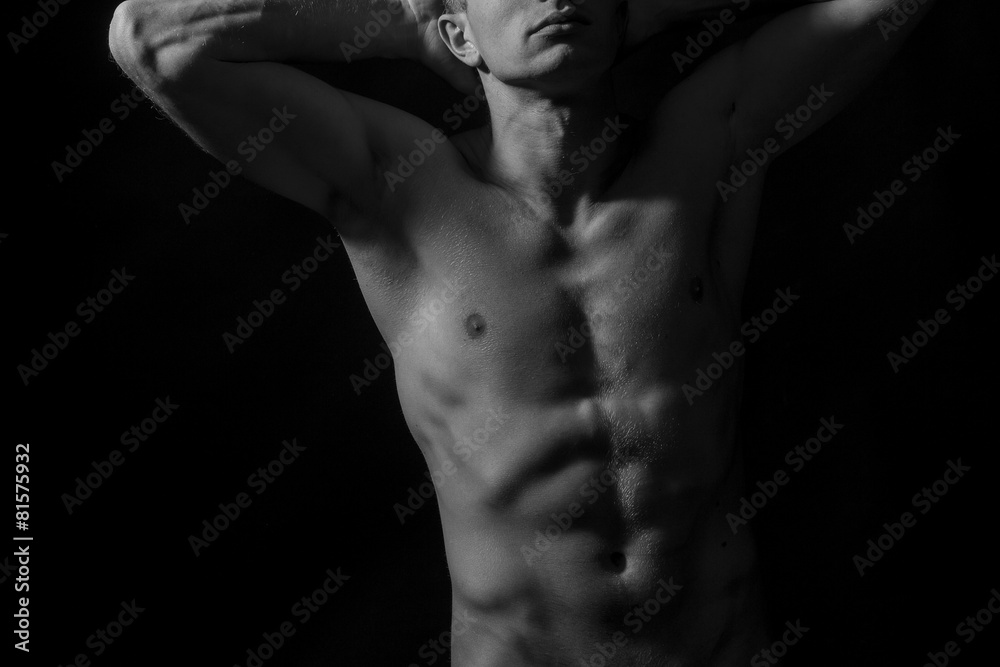 Sexy young naked man on studio Sexy young naked man on studio