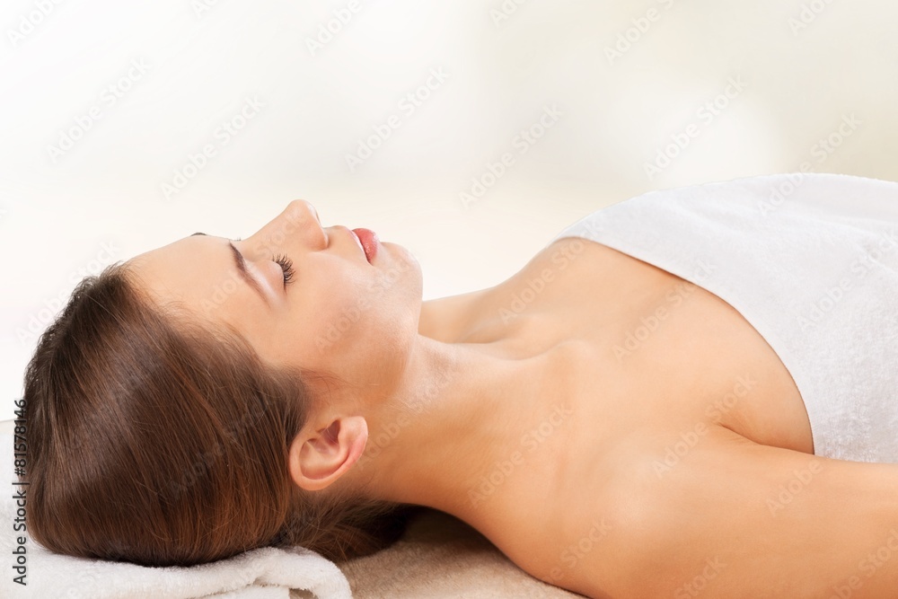 Salon. Beauty and spa concept - beautiful woman in spa salon Salon. Beauty and spa concept - beautiful woman in spa salon