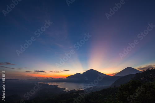Wonderful sunrise near volcano and lake Batur. Bali, Indonesia