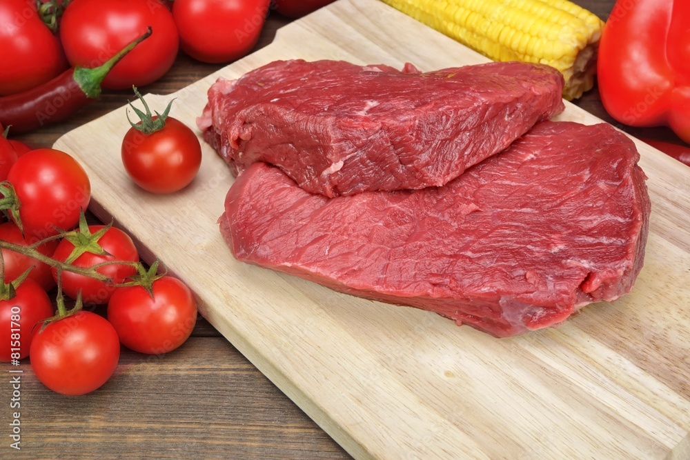 Raw Beef Steak And Vegetables Close-Up Raw Beef Steak And Vegetables Close-Up