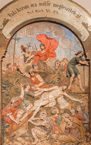Banska Stiavnica - Jesus nailed to the cross relief photo