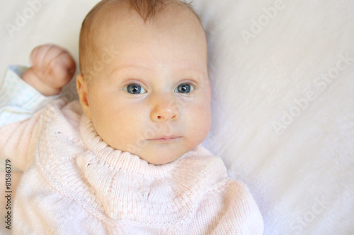 Sweet Newborn Baby Girl With Bright Blue Eyes