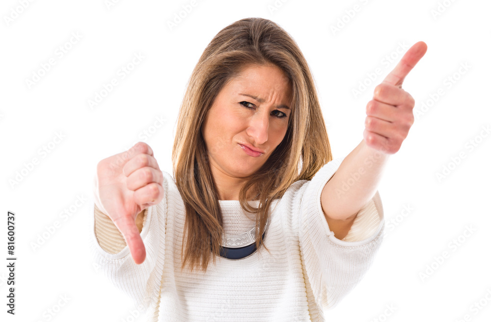 Woman making a good-bad sign