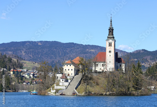 church with a high Bell Tower on the island on Lake Bled in Slov