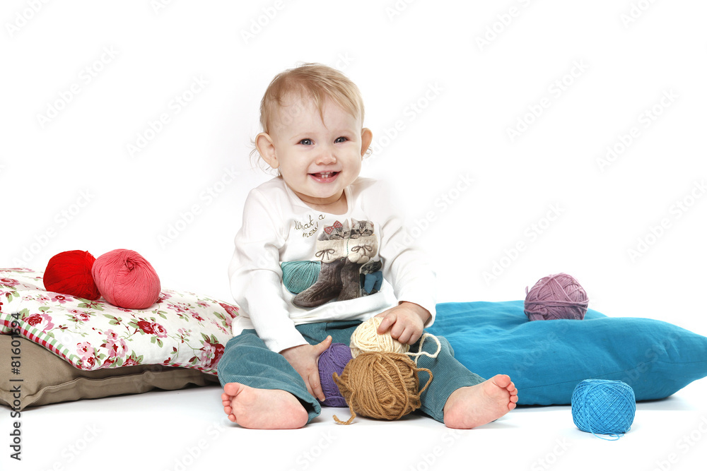 The child sits The child sits