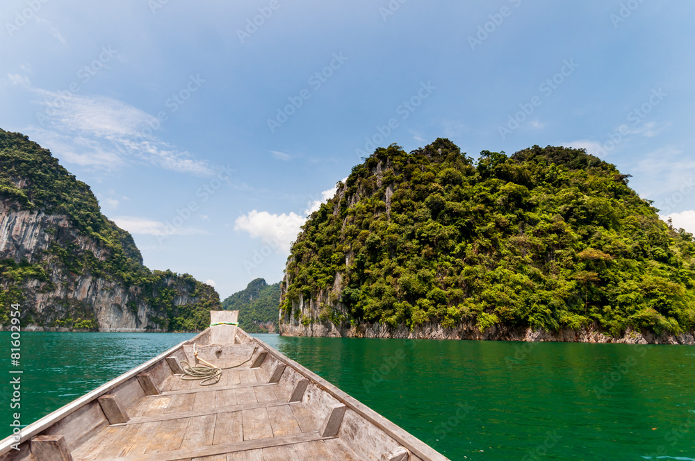 Naklejka premium Longtail boat at Cheow Lan Lake, Thailand