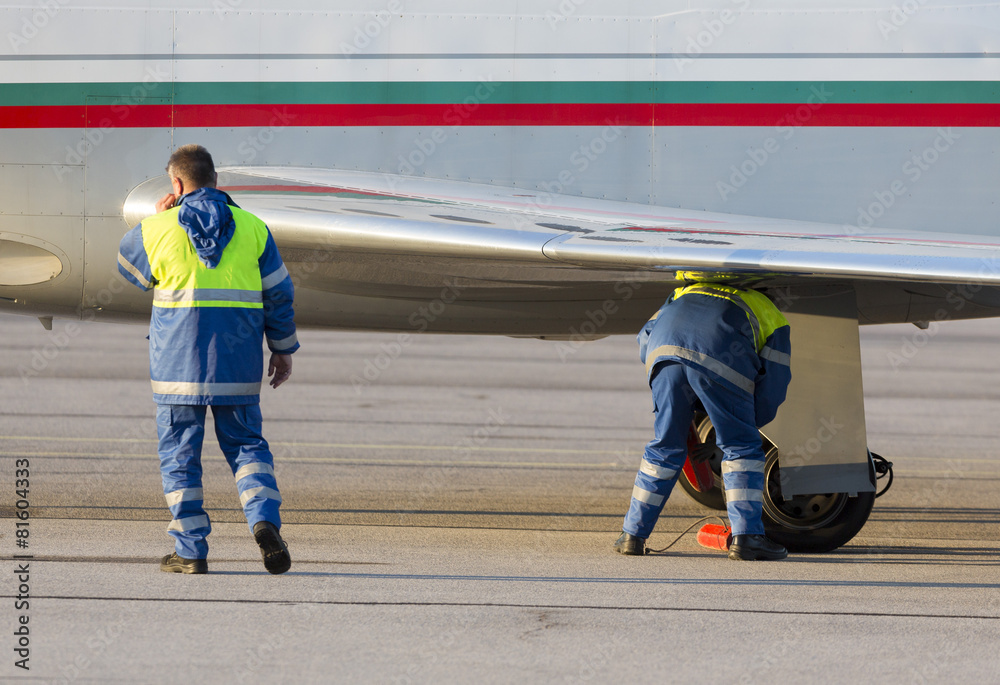 Airport worker runway airplane Airport worker runway airplane
