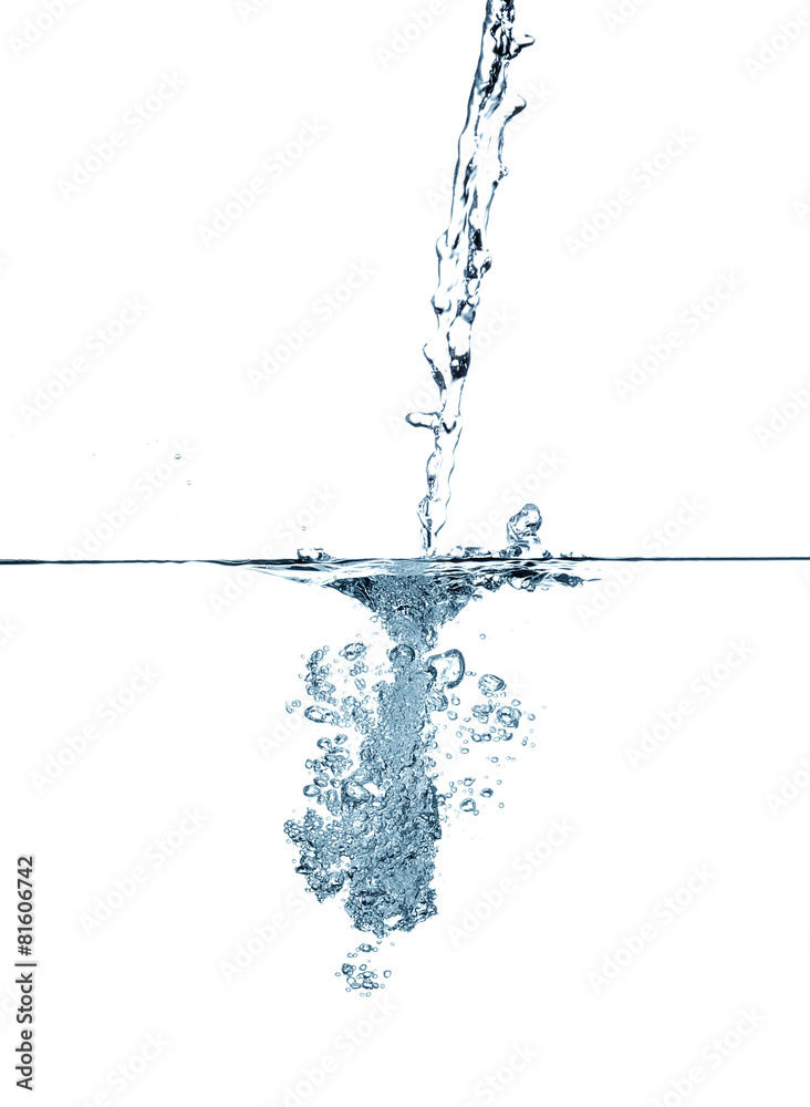 Water making bubbles upon being poured into more water. Water making bubbles upon being poured into more water.