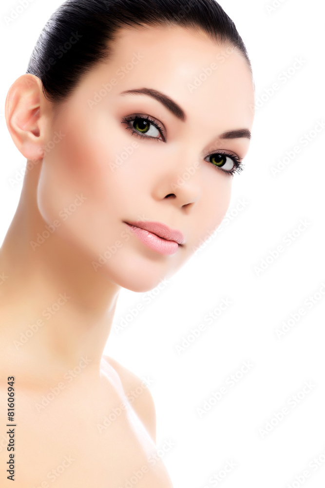 Fototapeta premium Face of a beautiful young woman, white background, isolated, cop