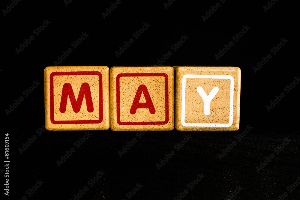 may on wood Cubic on black background may on wood Cubic on black background