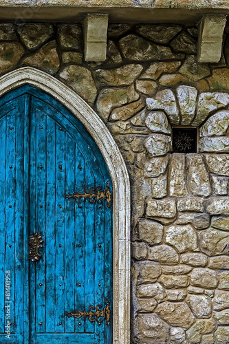 Background with ancient door to the castle and small window 1