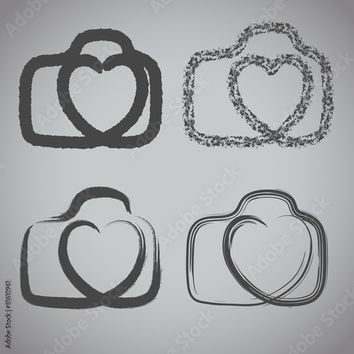 Vector: camera icon with heart-shaped. Doodle hand drawn sign in