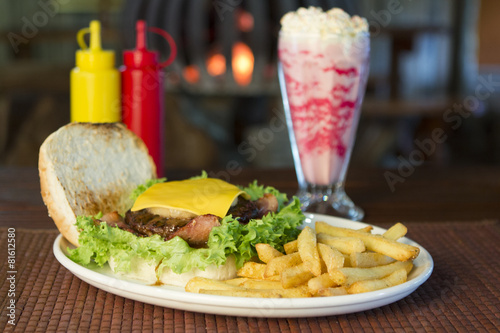 Burger and chips with a milkshake