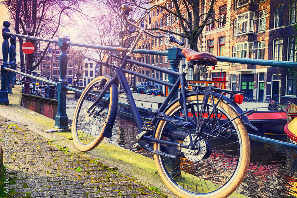 Amsterdam cityscape with old bicycle