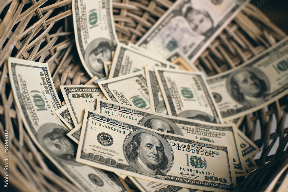 Money and Finance, American dollars are in the basket