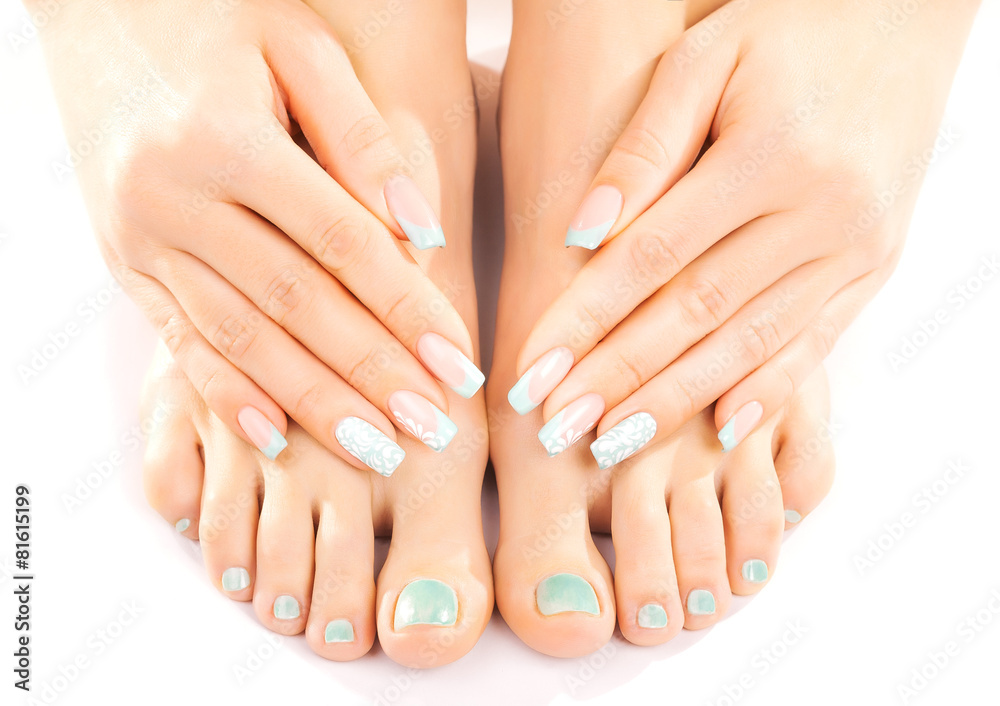 beautiful feet with turquoise pedicure isolated