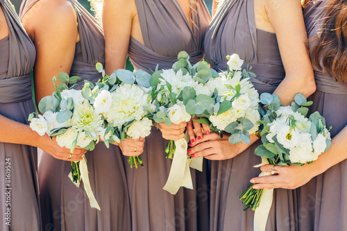 bridesmaids in brown with wedding bouquet photo