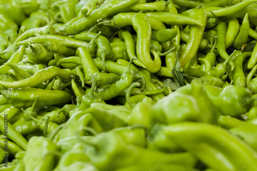 green peppers on display in the city bazaar green peppers on display in the city bazaar