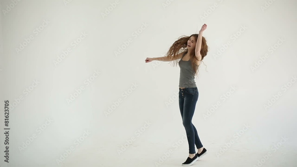Attractive girl winning cheering and joying. Slow motion Attractive girl winning cheering and joying. Slow motion
