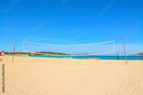 beach volley net and surfboards