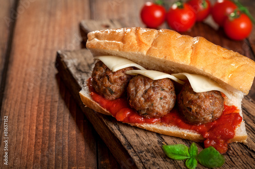 Meatballs and homemade tomato sauce in the bread photo