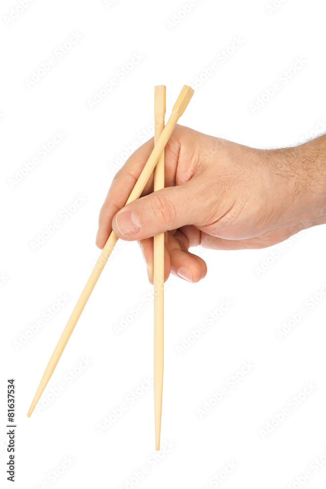 Hand with chopsticks Hand with chopsticks