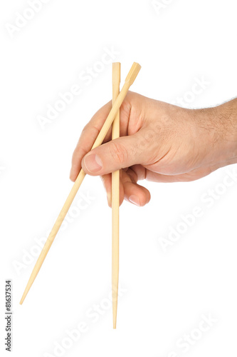 Hand with chopsticks