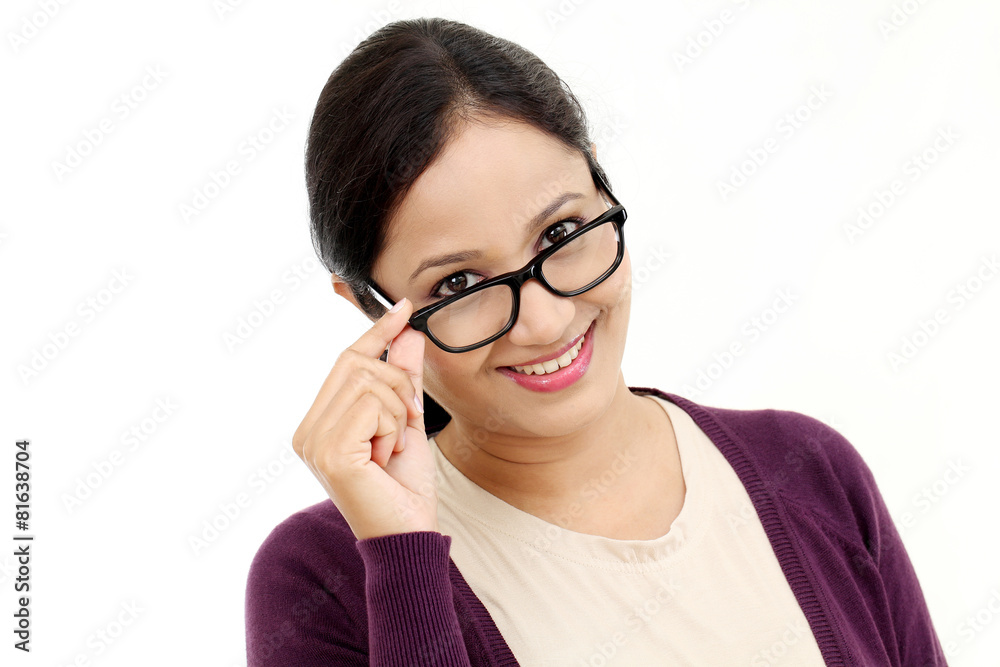 Young female optician showing eye glasses