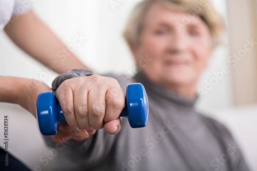 фотографія Elder woman training with physiotherapist