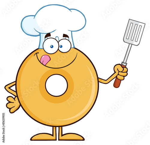 Chef Donut Cartoon Character Holding A Slotted Spatula
