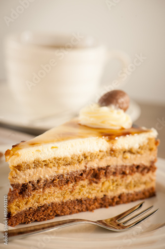 Deliceous slice og Caramel Mousse cake on a plate  for breakfast