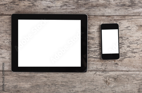 empty tablet and smart phone  on the wooden table