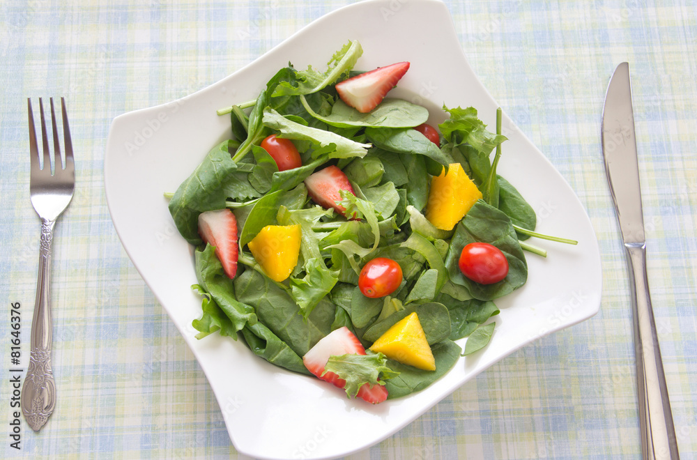 Healthy salad with fruits and vegetables