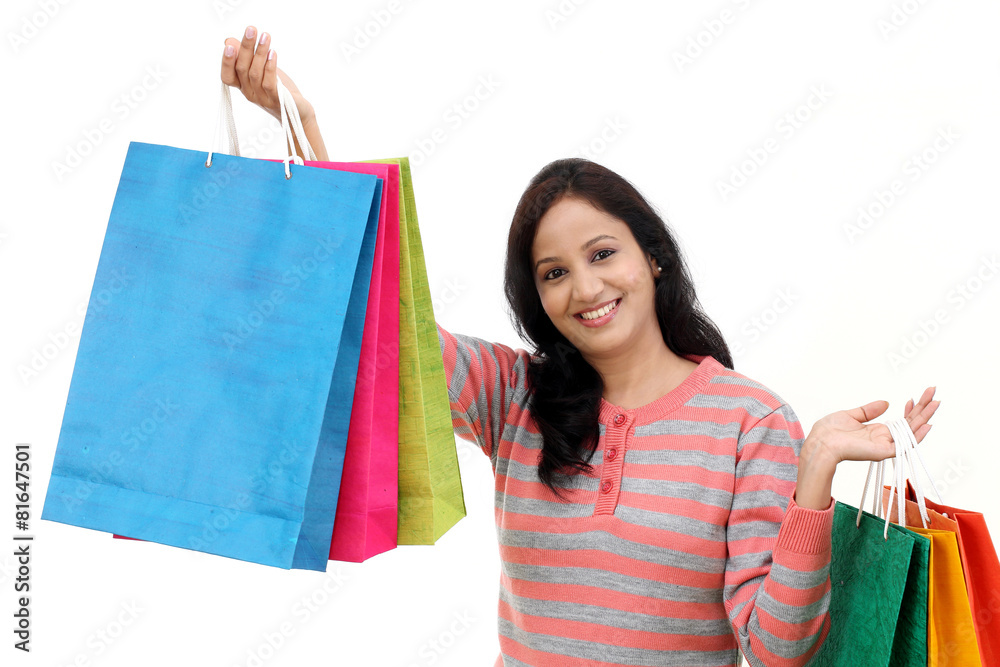 Young happy smiling woman with shopping bags Young happy smiling woman with shopping bags