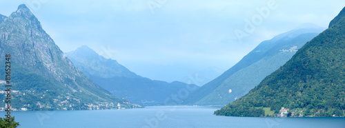 Lake Lugano summer misty view (between Switzerland and Italy).