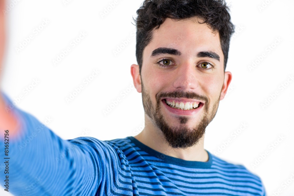Casual man taking a selfie Casual man taking a selfie