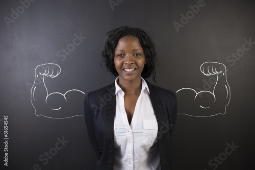 African American woman with healthy strong chalk arm muscles