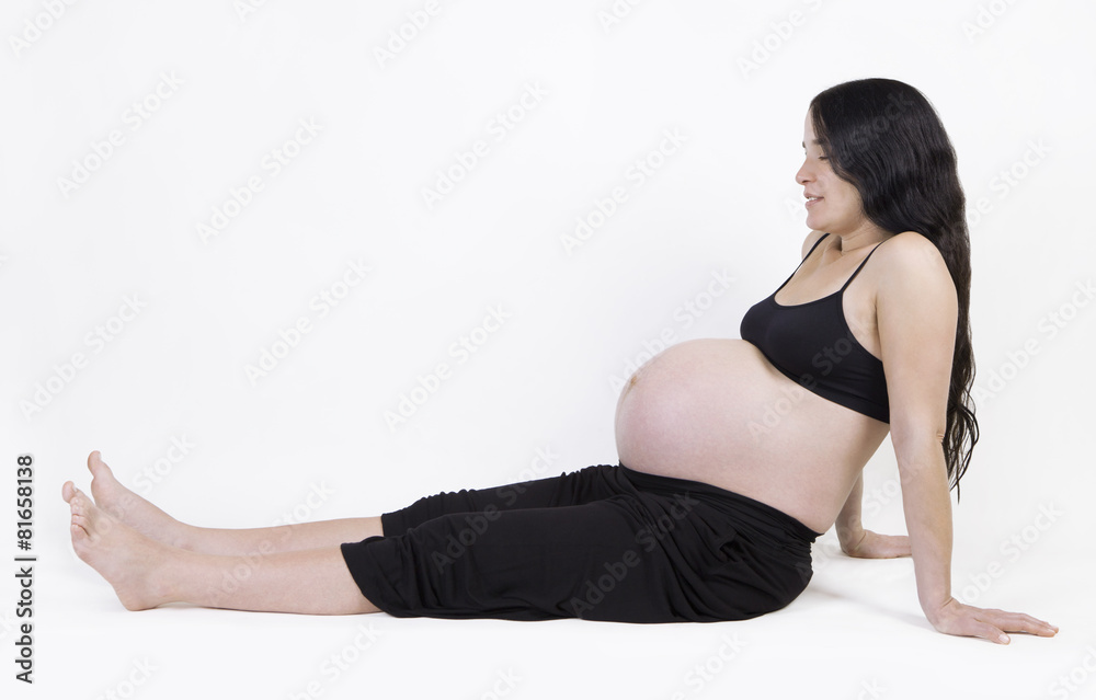 schwangere Frau sitzend schwangere Frau sitzend