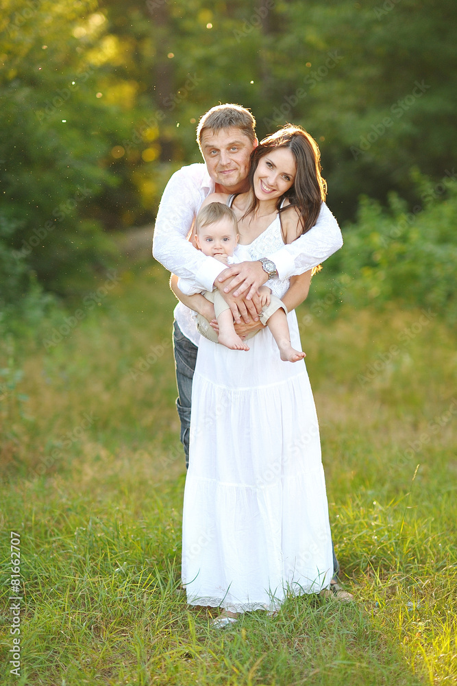 portrait of a happy family in summer nature portrait of a happy family in summer nature