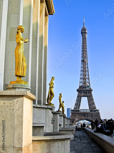 View of the statues and Eiffel Tower in Paris, France © Javen