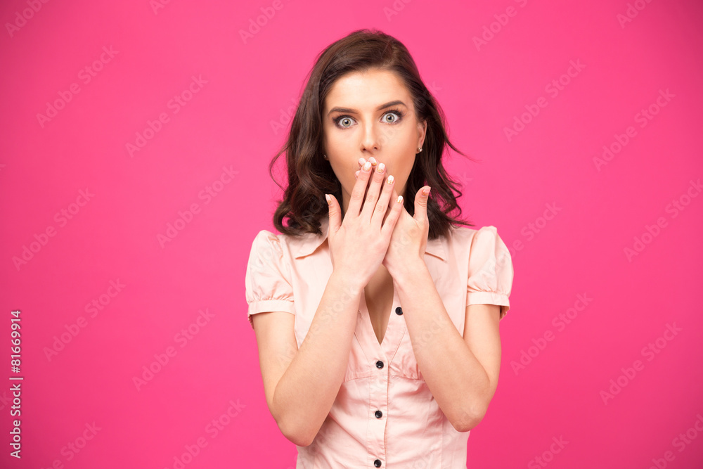 Surprised woman covering her mouth with hands Surprised woman covering her mouth with hands