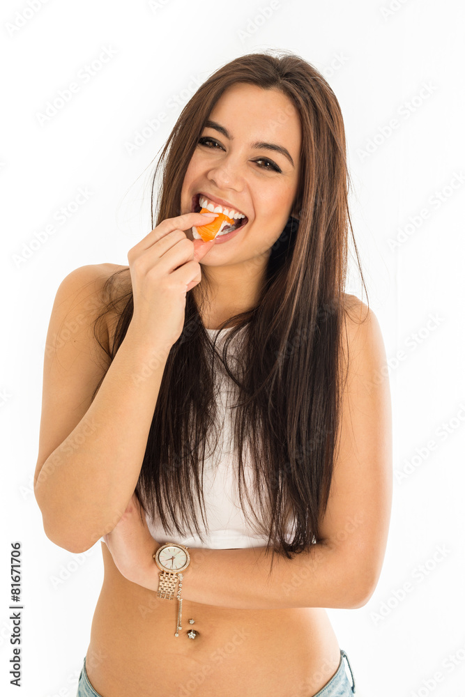Young attractive woman holding sushi with her fingers Young attractive woman holding sushi with her fingers