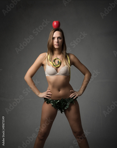 eve like william tell with apple on head photo