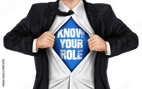 businessman showing Know your role words underneath his shirt
